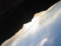 A photo of a mountain horizon, slanted so that the horizon runs from the upper left to bottom right